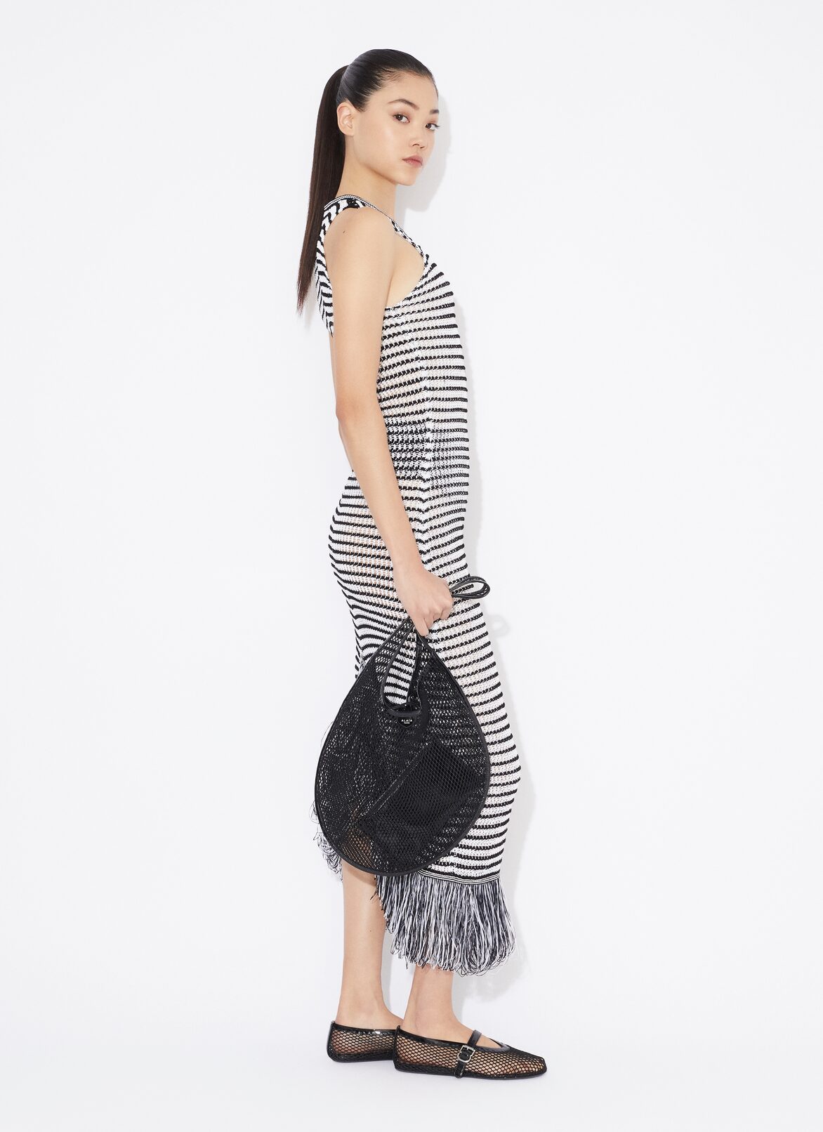 ABITO ALL'UNCINETTO CON FRANGE BODY CONSCIOUS  ALAÏA ABITO ALL'UNCINETTO CON FRANGE BODY CONSCIOUS  BIANCO/NERO